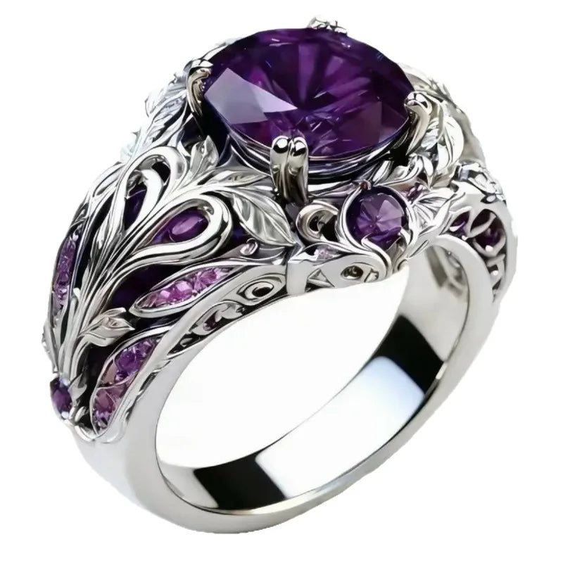 Retro fashion ring with purple cubic zirconia accents, stylish jewelry piece with intricate design by Corporación Turística.