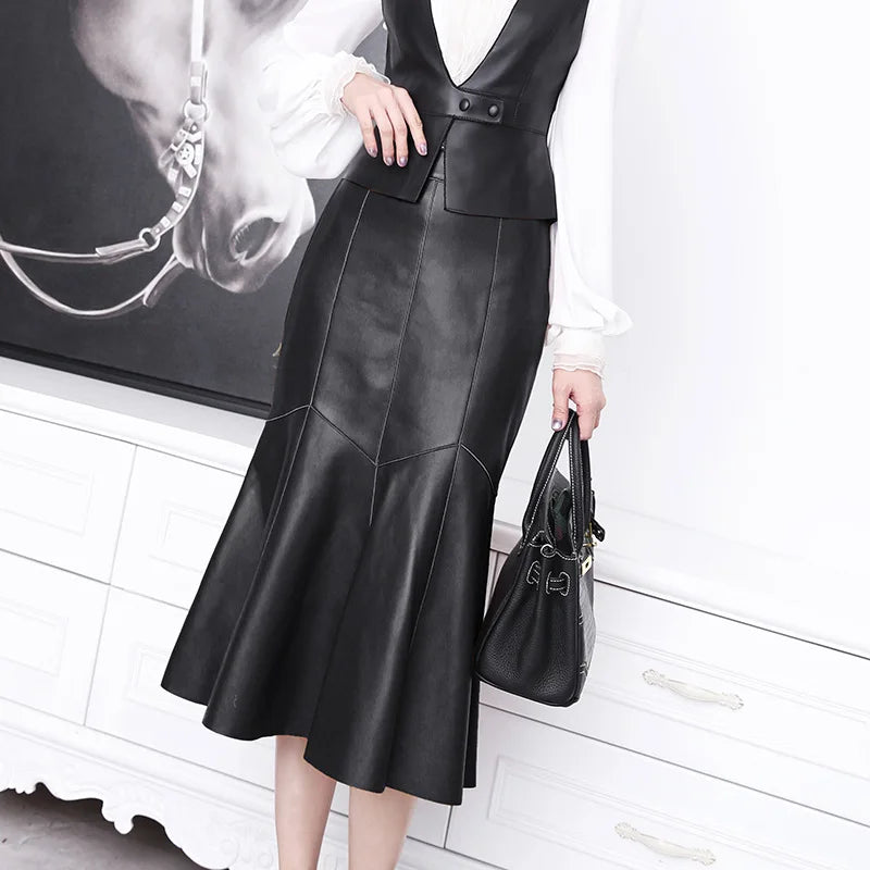 Yellow high-waist midi sheep leather skirt for women, shown on a model, from Corporación Turística.