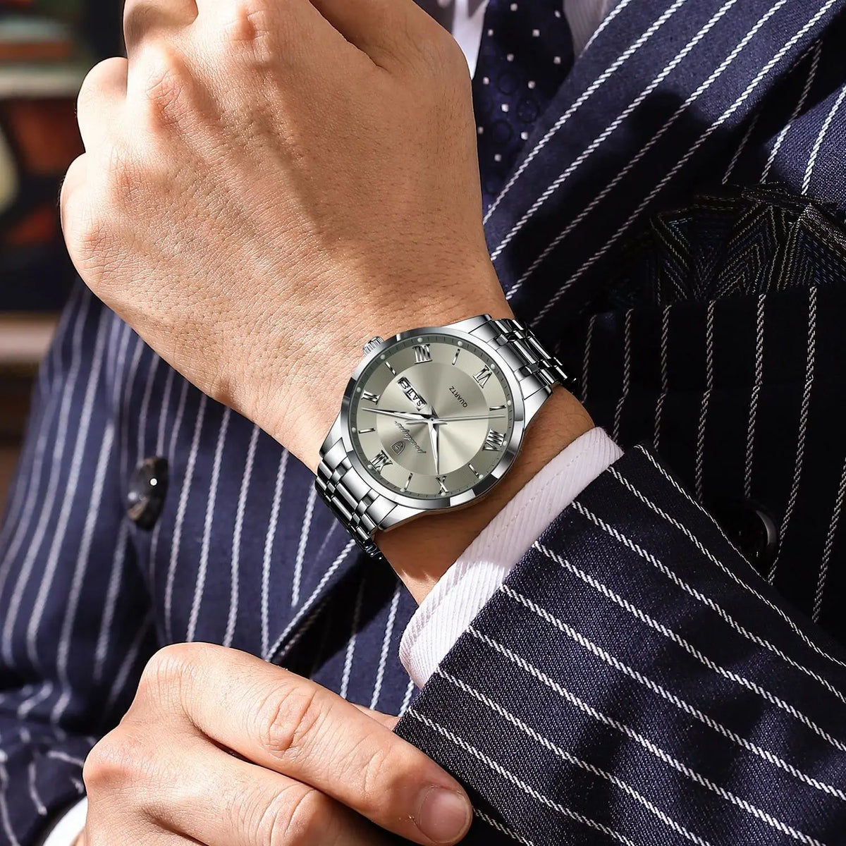 Luxury POEDAGAR men's fashion watch with gold and white dial, featuring a sleek design and metal strap.