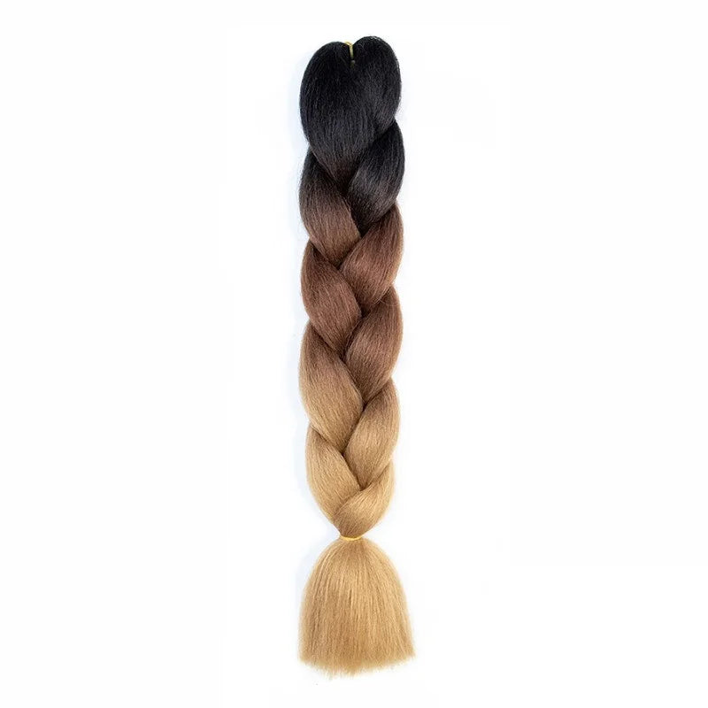 Long synthetic Yaki straight hair braids, 24 inches, produced by Corporación Turística, displayed in a close-up image.