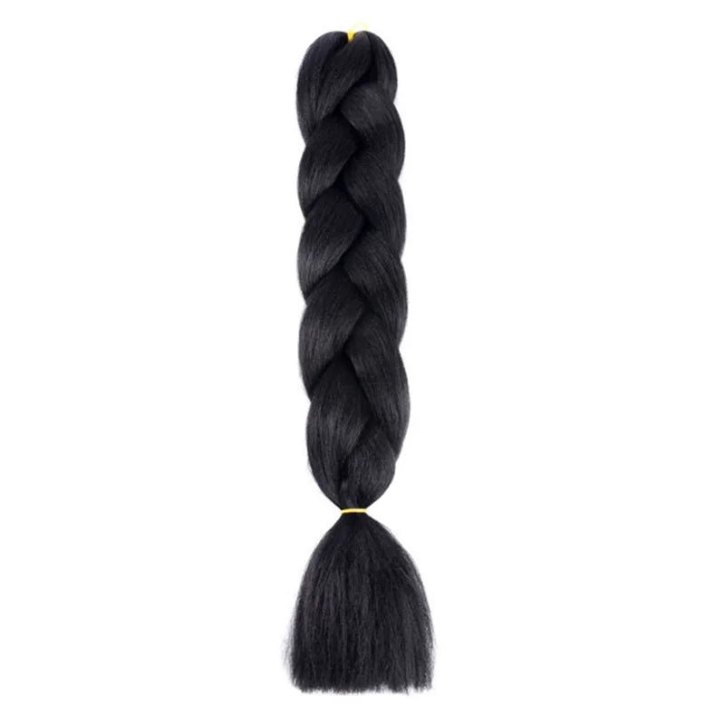 Long synthetic Yaki straight braids, 24 inches, from Corporación Turística, shown in natural black color.
