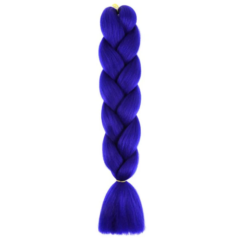 Long synthetic Yaki braid extensions, 24 inches, straight style, from Corporación Turística, shown in a close-up image.