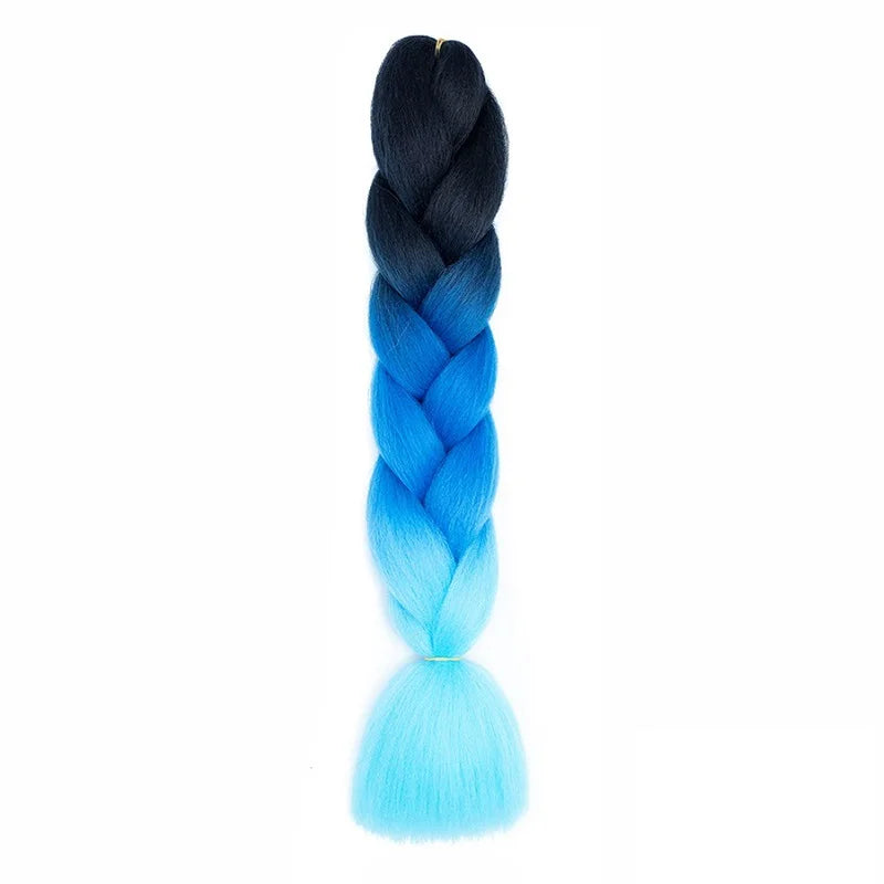 Long synthetic Yaki straight braid extensions, 24 inches, from Corporación Turística, displayed in a close-up image.
