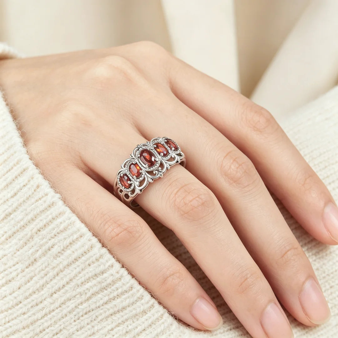 Silver crown ring for women with a cut-style design, crafted by Corporación Turística, detailed and elegant jewelry piece.