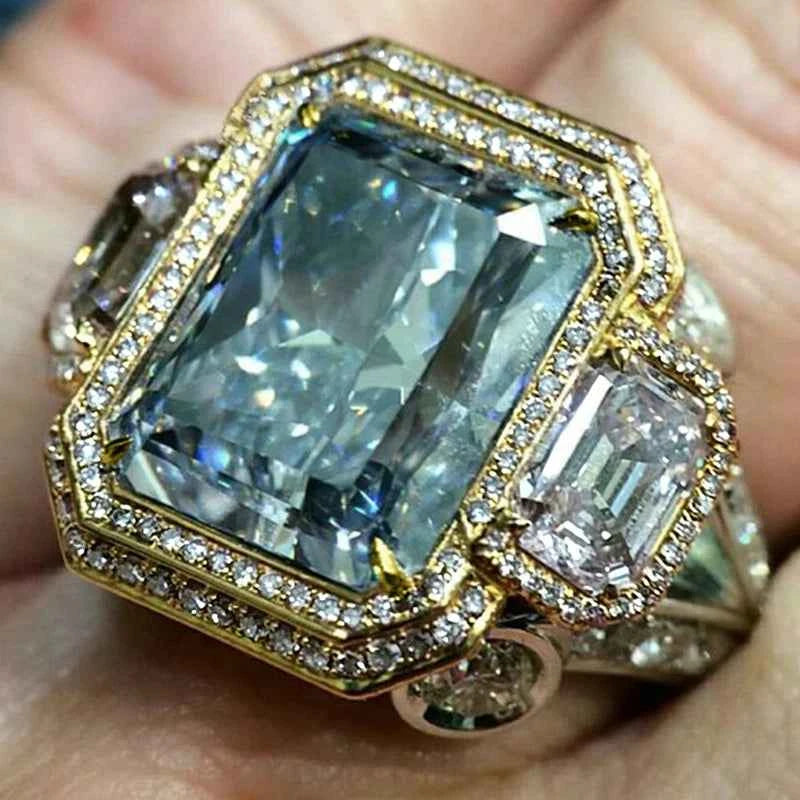 Blue cubic zirconia rectangular rings by Huitan, showcasing shiny, elegant jewelry with a modern design.