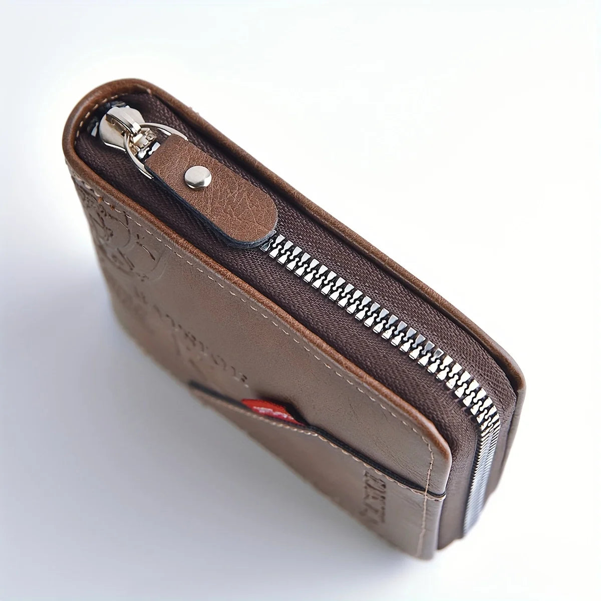Black men's PU leather wallet with zipper, coin pocket, and card slots, compact design from Corporación Turística.