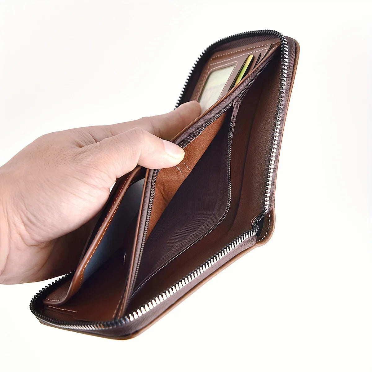 Black men's PU leather wallet with zipper, card slots, and coin pocket, featuring a sleek, compact design by Corporación Turística.