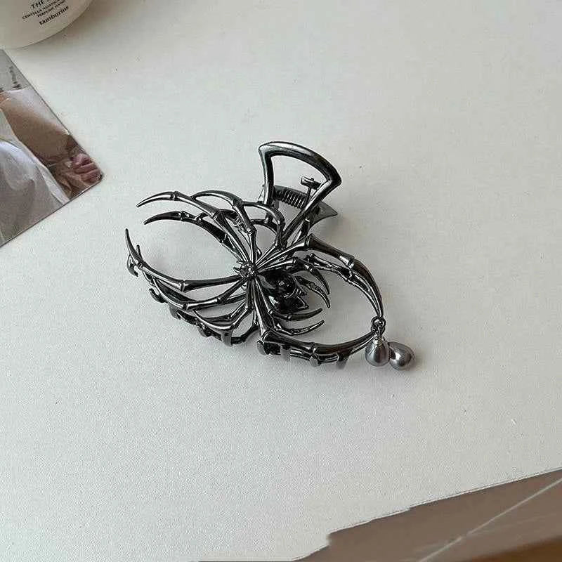 Gothic pearl spider hair clip by Corporación Turística, featuring intricate black design and pearl accents for stylish hair accessories.