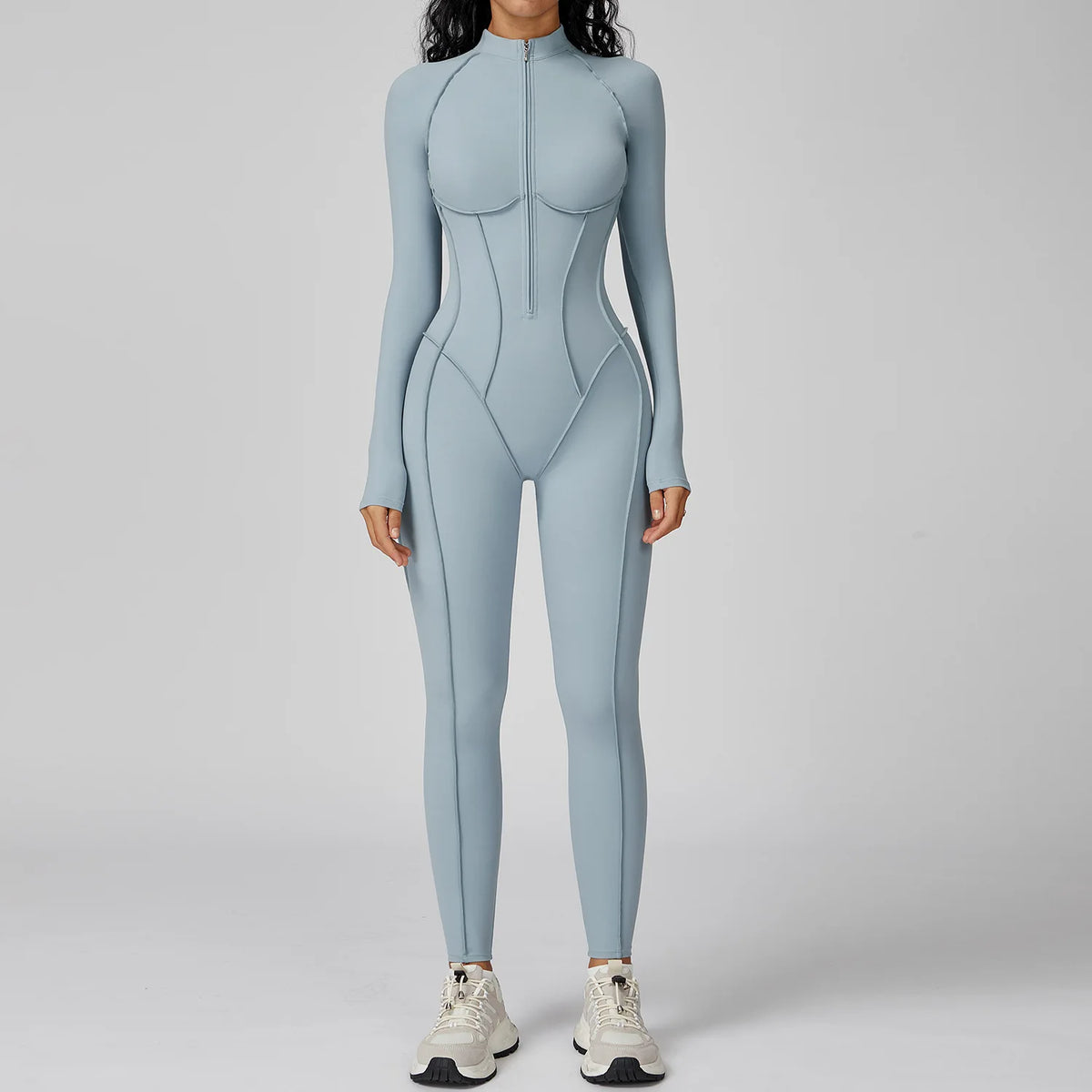 High-elasticity black women's yoga bodysuit by Corporación Turística, designed for comfort and flexibility during exercise.