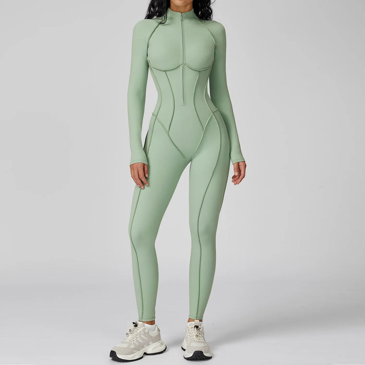 Black women's yoga bodysuit by Corporación Turística, high-elasticity athletic jumpsuit for active wear, full-length and form-fitting.