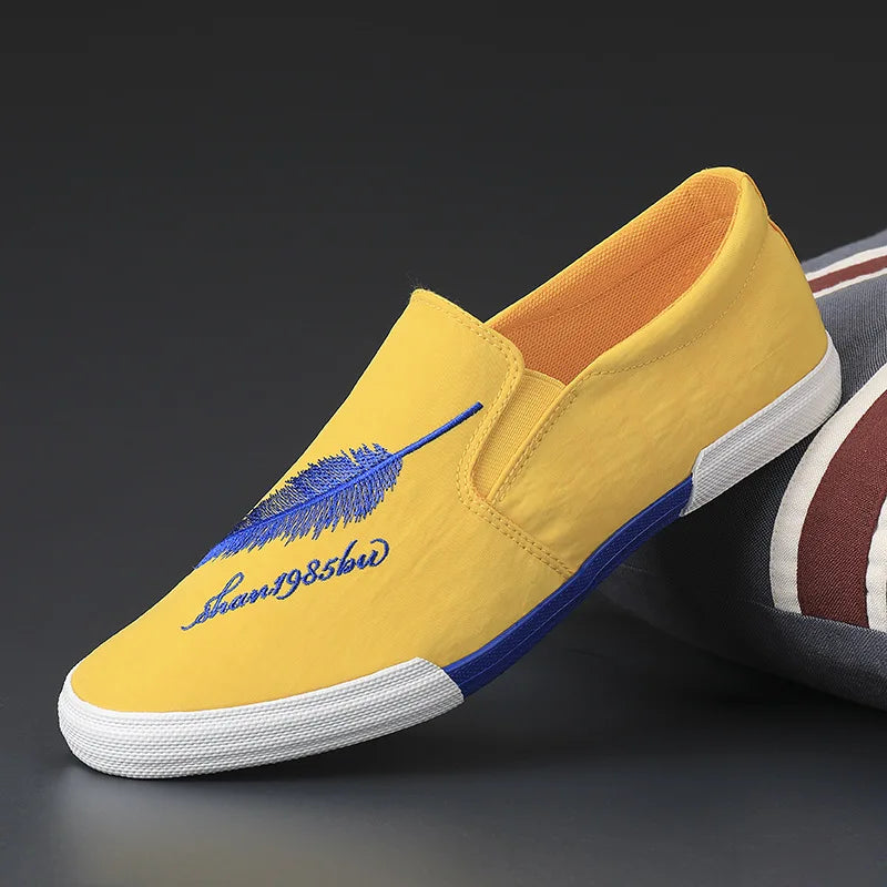 Men's casual fabric shoes by Corporación Turística, yellow canvas sneakers, comfortable slip-on footwear for everyday wear.