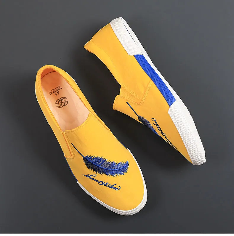 Casual men's fabric shoes by Corporación Turística in yellow, featuring comfortable slip-on sneakers with durable canvas material.