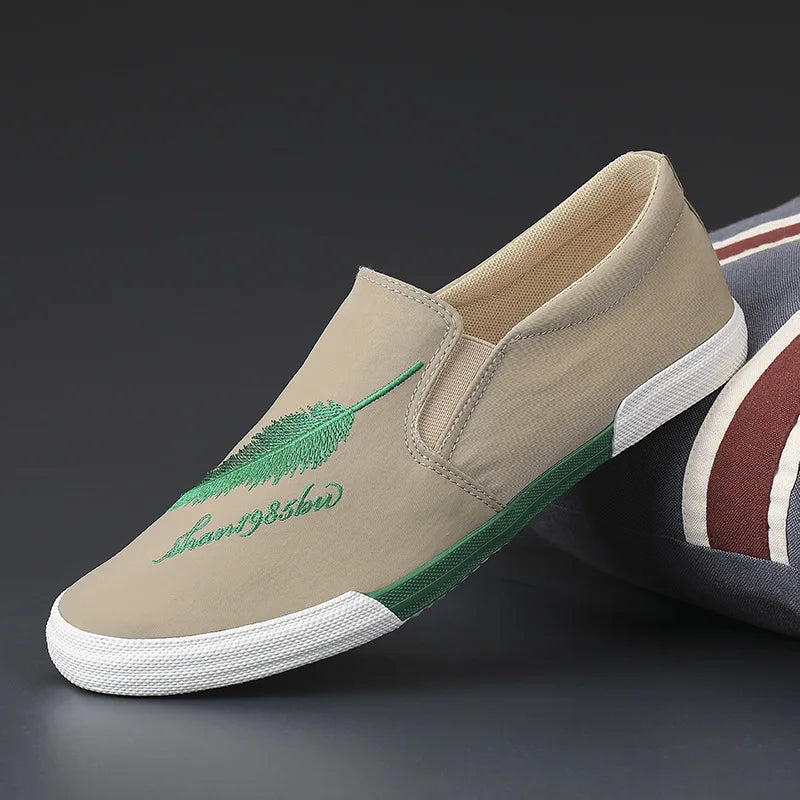 Yellow men's casual fabric shoes by Corporación Turística, lightweight slip-on sneakers for everyday wear.
