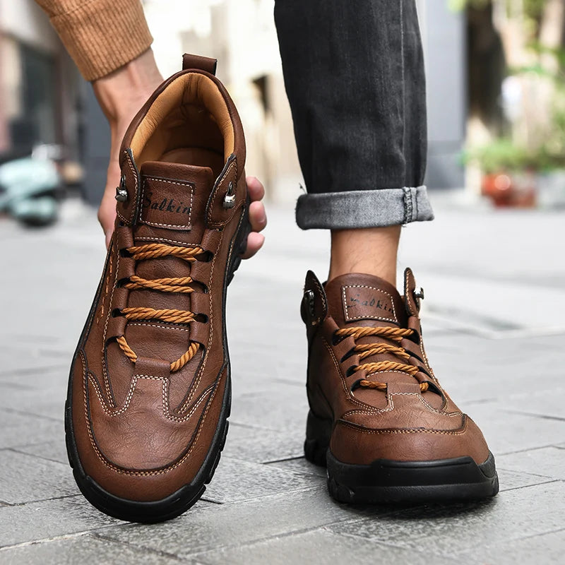 Yellow men's high fashion boots with round toes from Corporación Turística, stylish tall leather footwear for men.