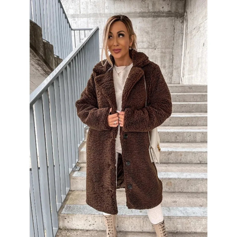 Long women's autumn and winter coat in apricot color by Corporación Turística, stylish and warm for cold weather.