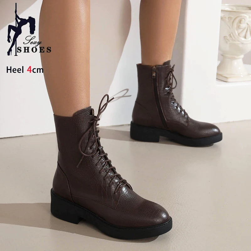 Women's new ankle boots with side zipper from Corporación Turística, featuring stylish design and sleek leather finish.