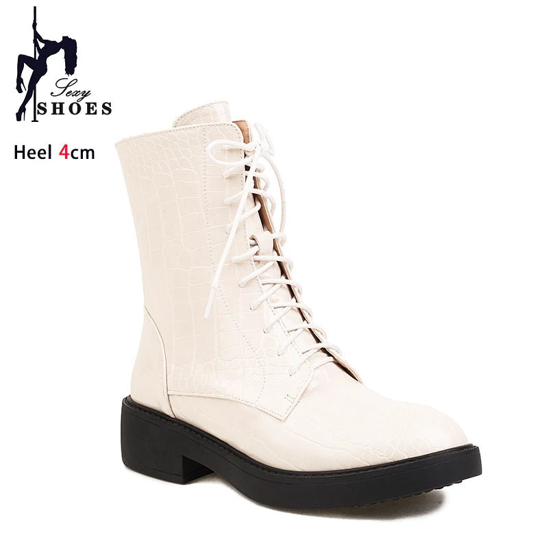 Nuevas botas para mujer con cremallera lateral, estilo moderno y elegante, en color negro, con suela resistente y diseño chic.