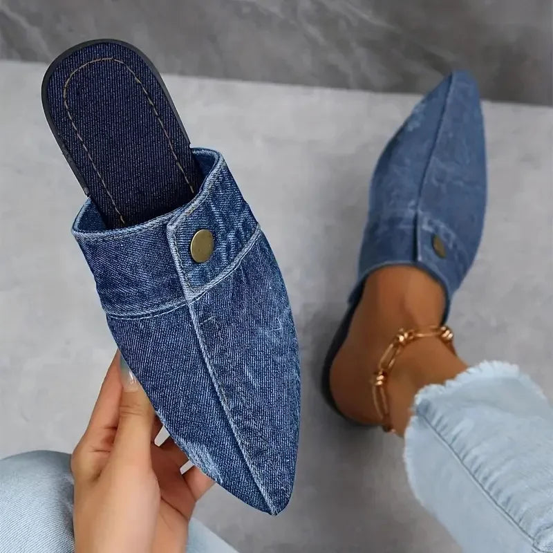 Blue women's comfortable and versatile sneakers by Corporación Turística, showing the side view of the shoes.