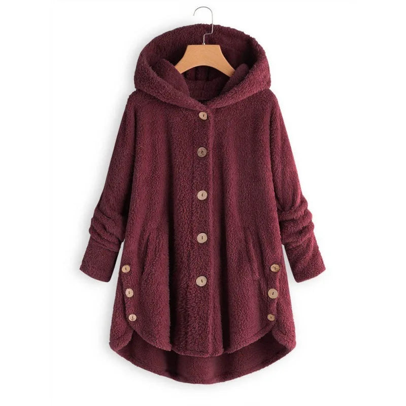 Light blue women's autumn and winter coat by Corporación Turística, showcasing a warm, cozy winter outerwear design.