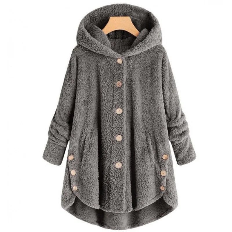 Light blue women's fall and winter coat by Corporación Turística, warm, cozy, and suitable for cold weather.