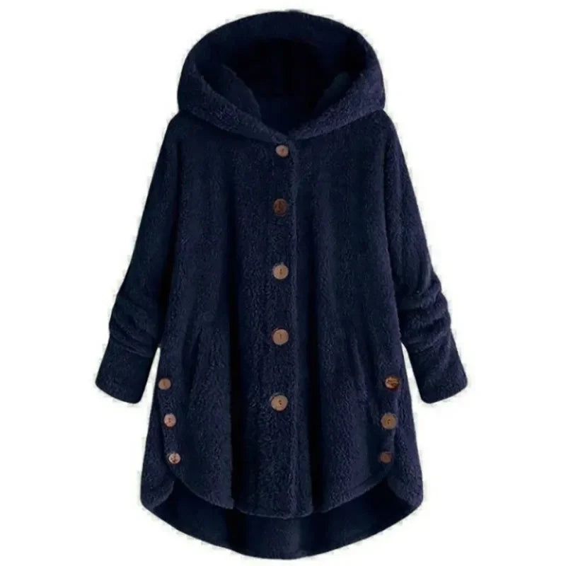 Light blue women's autumn and winter coat by Corporación Turística, warm, cozy, and stylish outerwear for colder weather.