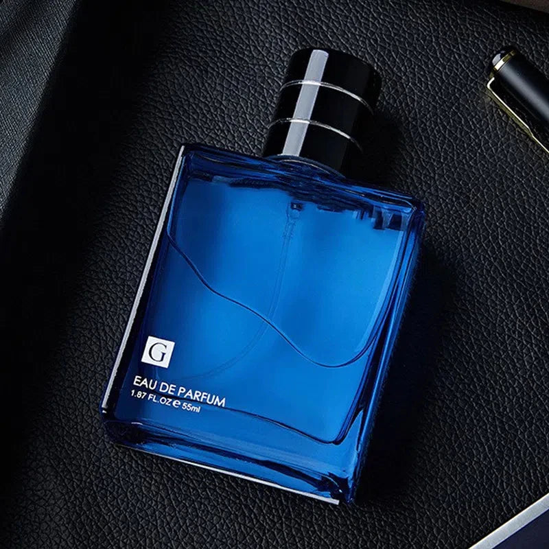 Set of 2 men's Eau De Parfum bottles from Corporación Turística, 55 ml each, featuring blue packaging and elegant design.