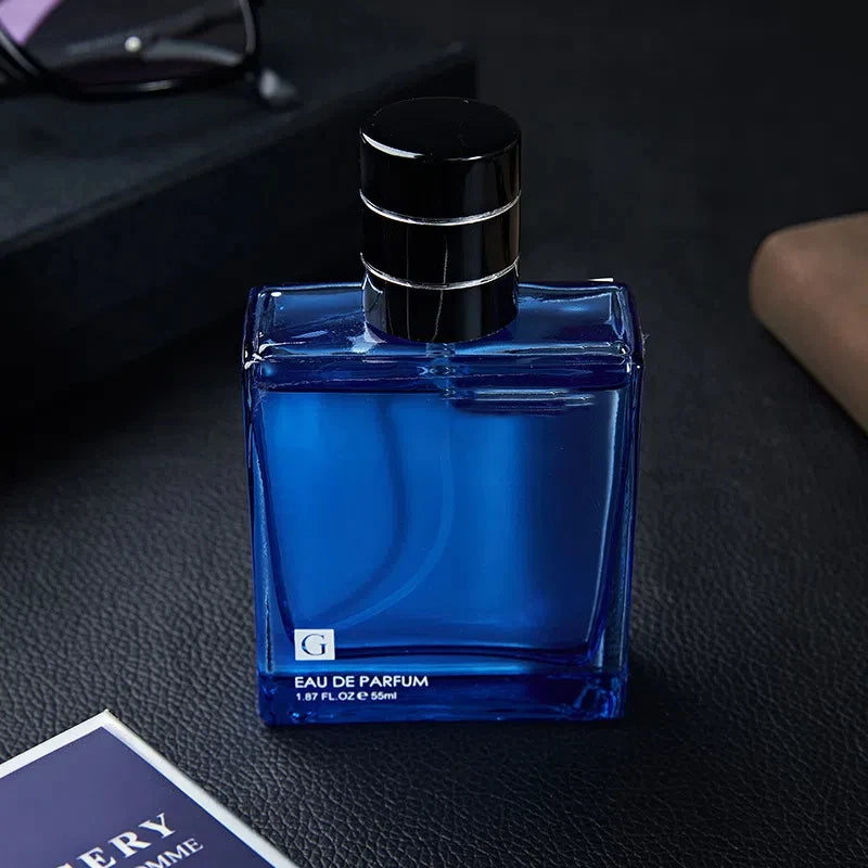 Set of 2 men's Eau De Parfum bottles by Corporación Turística, 55 ml each, with sleek blue packaging and elegant design.