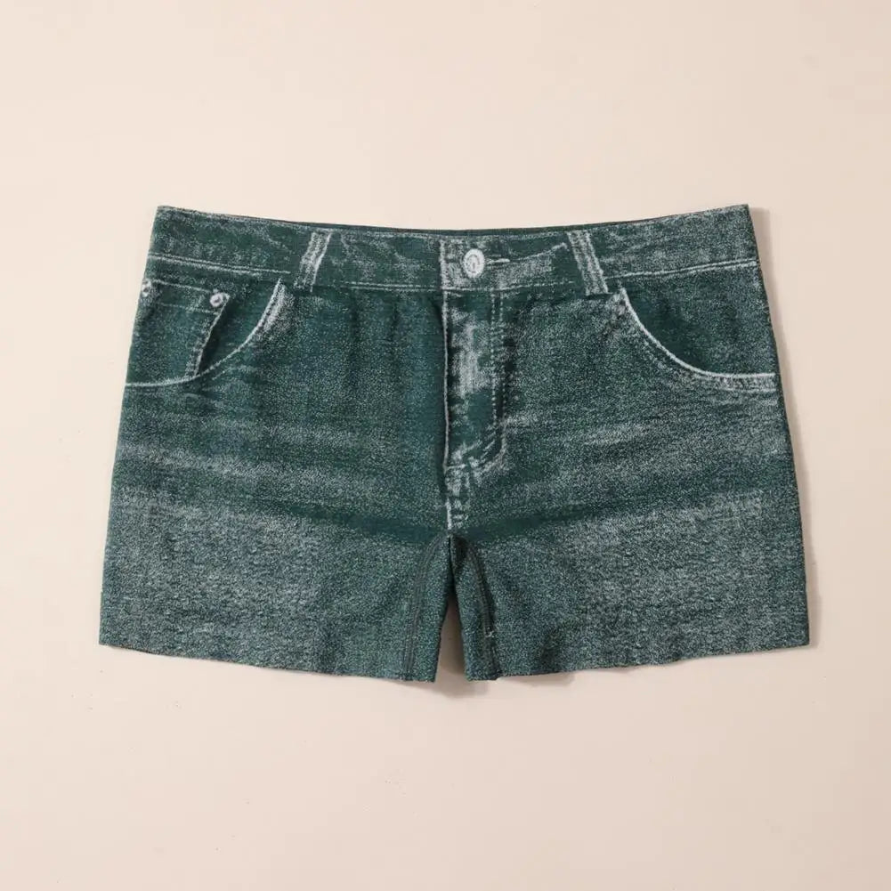 Blue denim imitation leggings for women, short style, from Corporación Turística, shown laid flat with stretch fabric details.