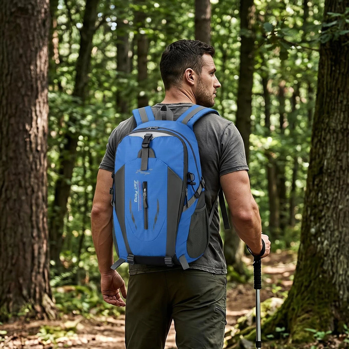 Blue outdoor hiking backpack by Corporación Turística, water-resistant with multiple compartments and adjustable straps.