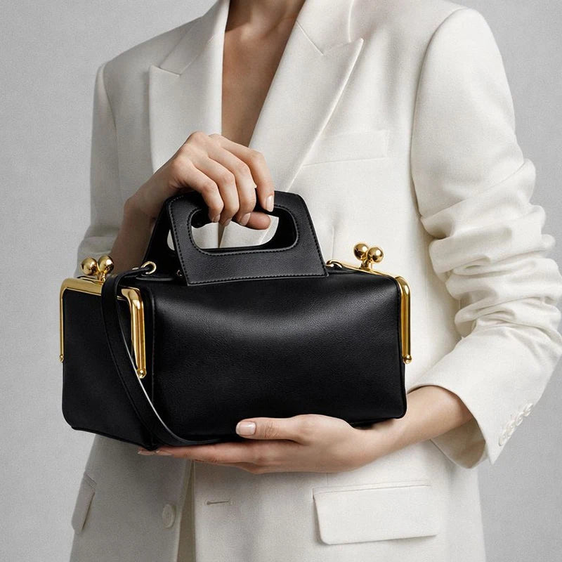 Blue PU shoulder bag with frame closure design, stylish and spacious, by Corporación Turística.