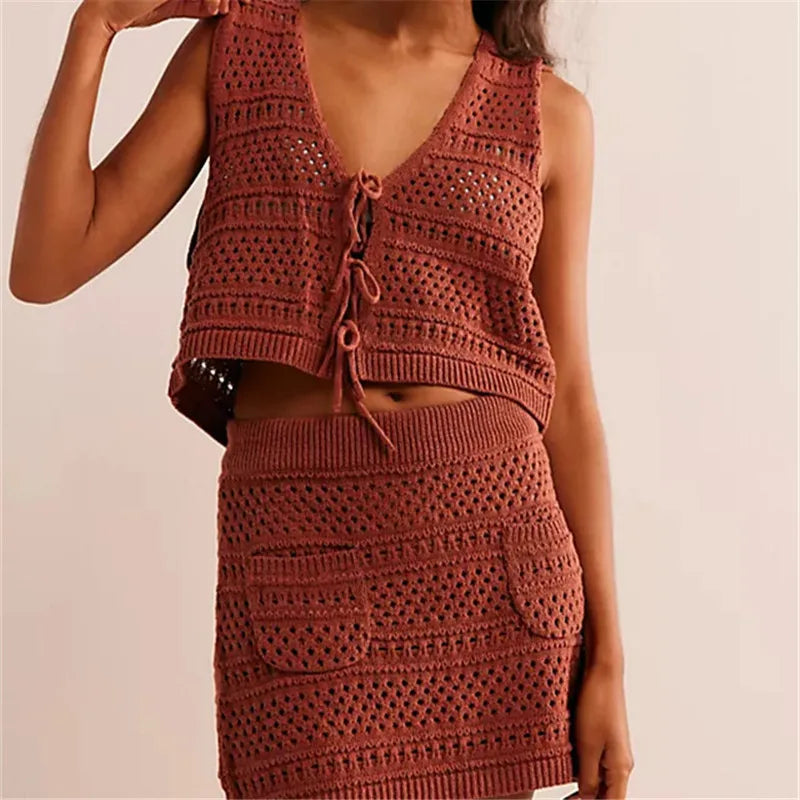 Two-piece crochet knit set for women by Corporación Turística, featuring a stylish top and matching pants in soft, textured fabric.
