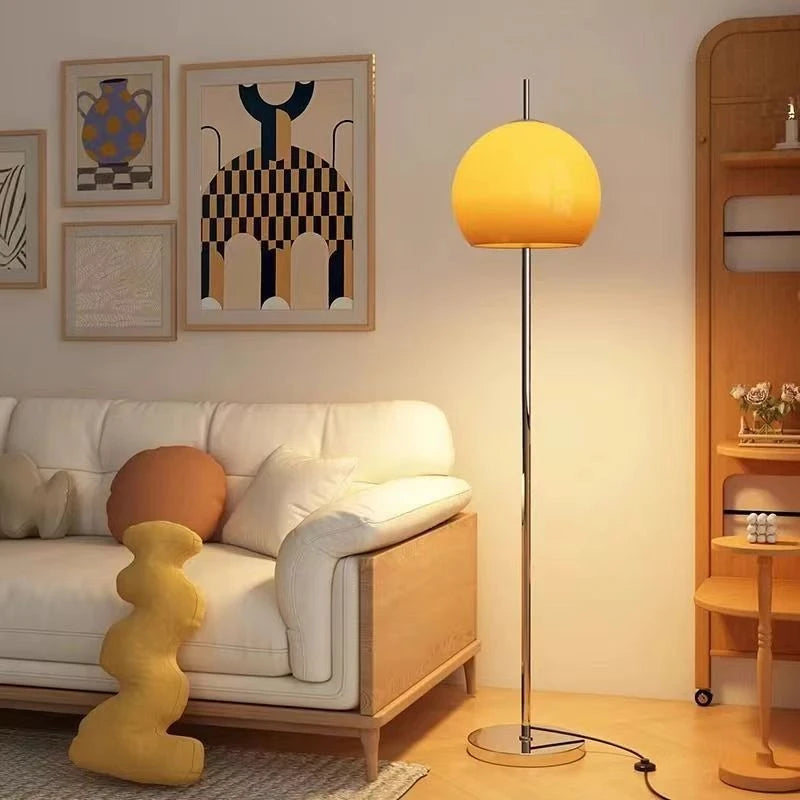 Retro crystal orange floor lamp with warm LED light, stylish H-shaped design for modern living spaces.