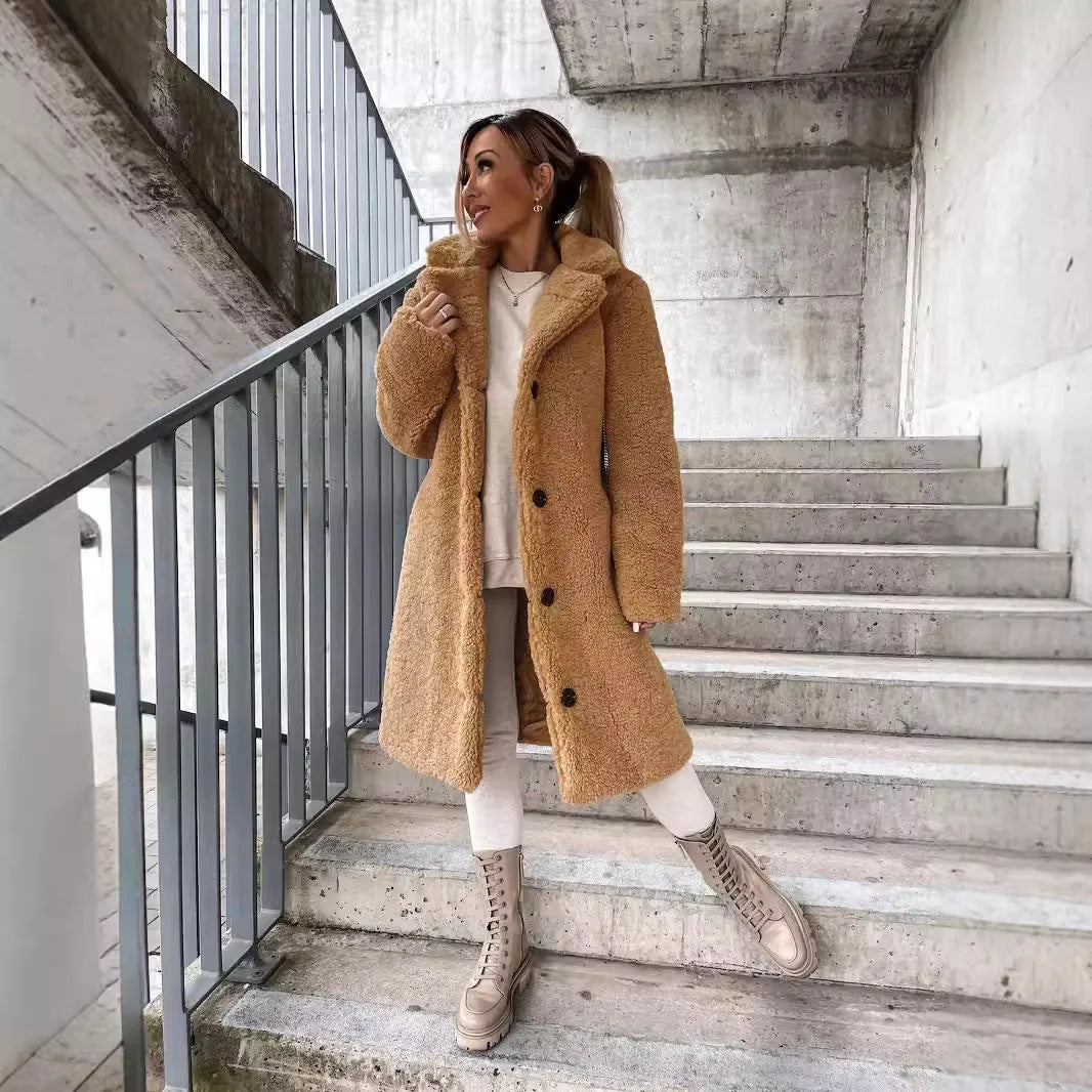 Beige oversized long winter coat from Corporación Turística, casual, soft, thick, warm, and plush for cold weather.