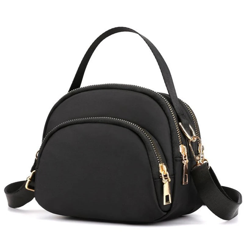 Red versatile modern shoulder bag for men and women by Corporación Turística, with adjustable strap and stylish design.