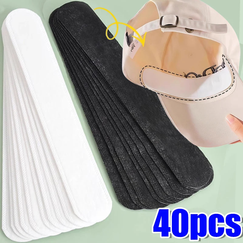 Black sweat-absorbing hat stickers from Corporación Turística, 10/40 pack, designed to reduce sweat and improve comfort.
