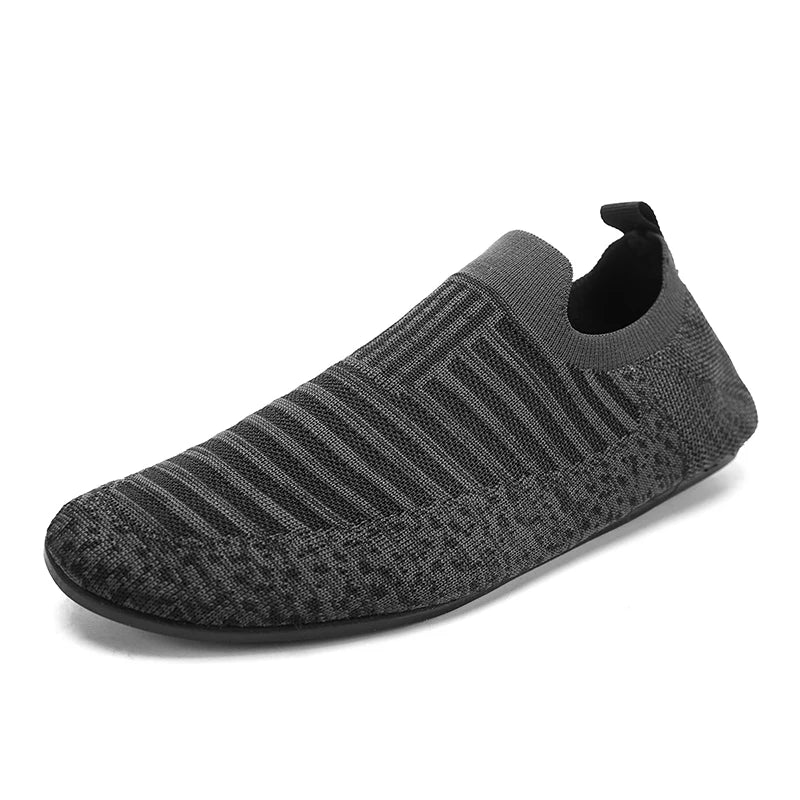 Black YRZL men's driving moccasins with leather soles, designed for comfort and style in casual and driving occasions.