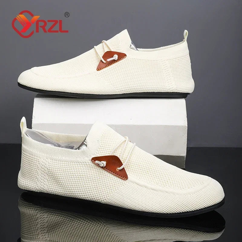 Black men's mesh loafers by YRZL, lightweight moccasins for driving and casual wear, crafted by Corporación Turística.