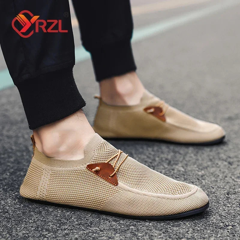 Black YRZL mesh loafers for men by Corporación Turística, stylish slip-on moccasins for casual and driving wear.