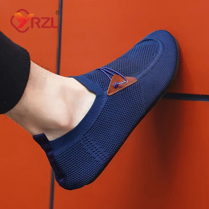 Black men's mesh loafers by YRZL for driving and casual wear, featuring breathable fabric and comfortable slip-on design.