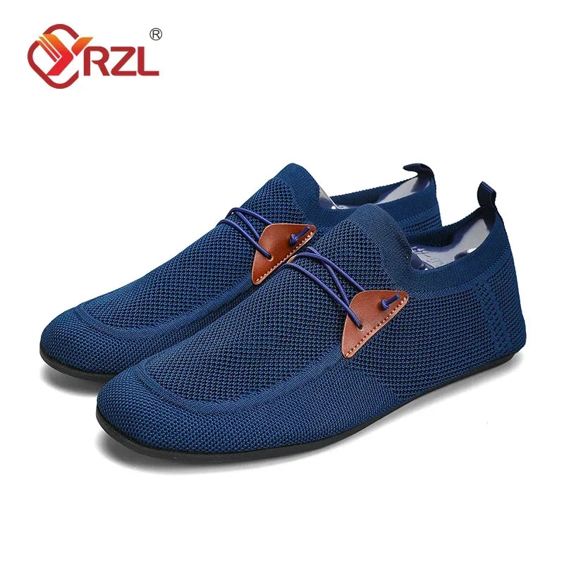 Black YRZL men's mesh loafers by Corporación Turística, designed for comfortable driving and casual wear.
