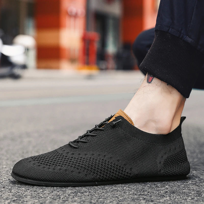 Black MAEDEF men's driving shoes by Corporación Turística, casual and comfortable footwear for everyday wear.