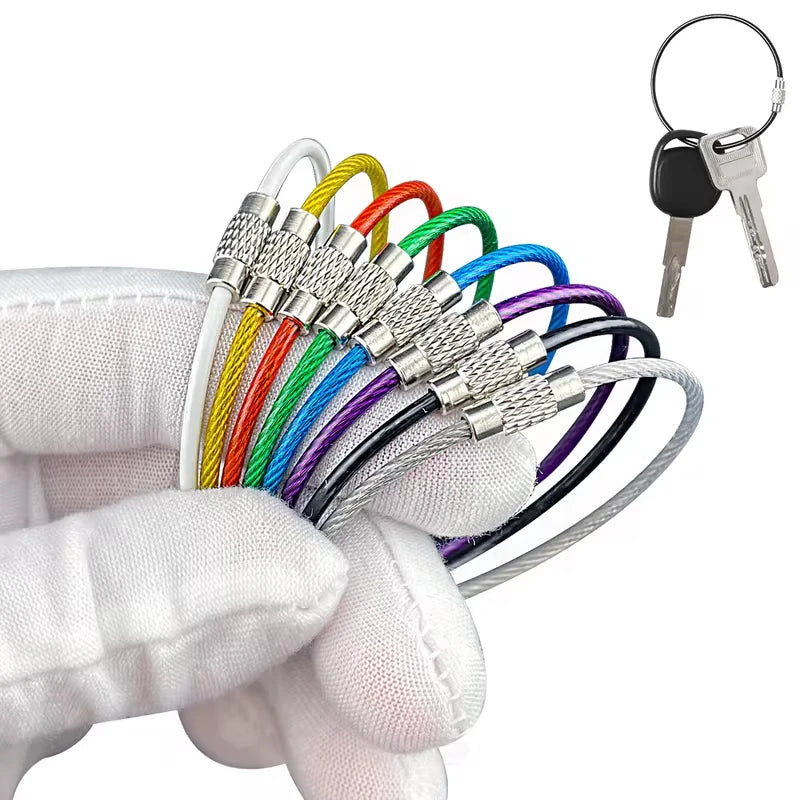 Set of five stainless steel keychains with black PVC coating by Corporación Turística, featuring durable, sleek wire design.