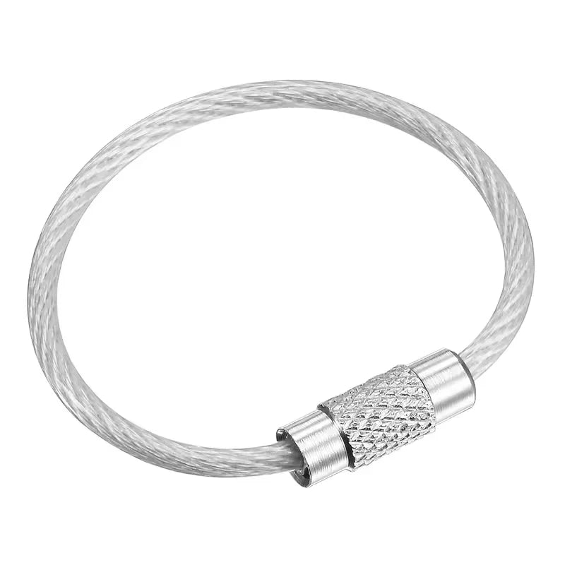 Set of five black stainless steel wire keychains with PVC coating from Corporación Turística, featuring durable, sleek design.