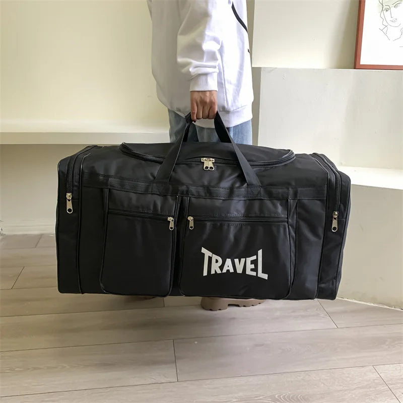 Large capacity foldable travel bag by Corporación Turística, black sporty duffel bag with spacious interior and durable handles.