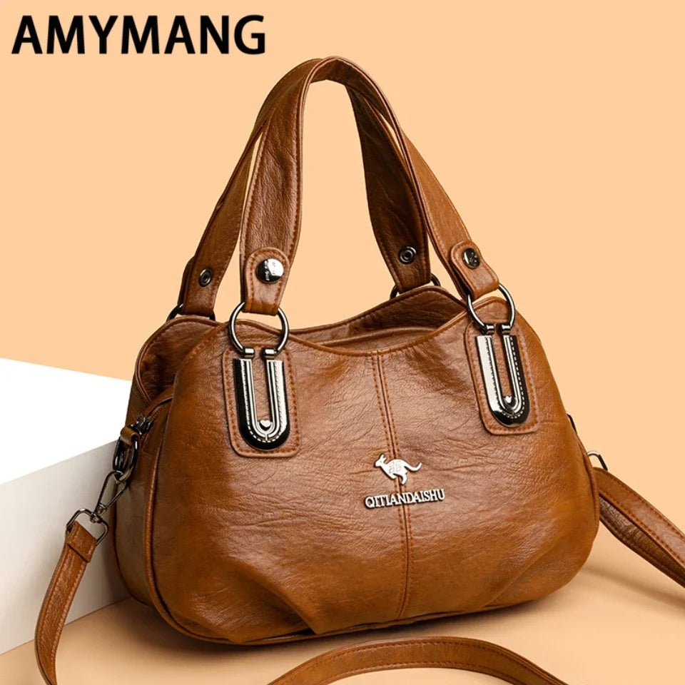 Luxury 3-layer large capacity handbag by Corporación Turística, black leather tote with spacious interior and elegant design.