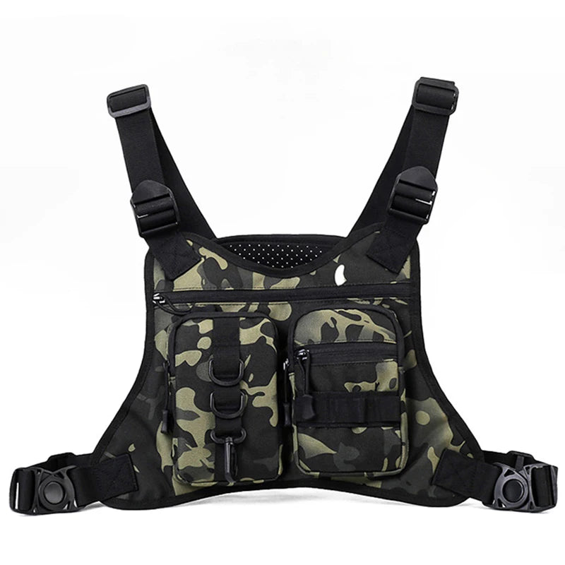 Black camouflage tactical vest with front MOLLE system and chest pocket for Corporación Turística, designed for outdoor or tactical use.