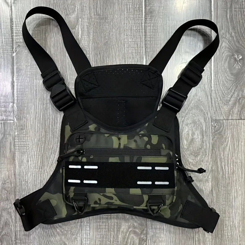 Black tactical vest with chest pouch and camping backpack from Corporación Turística, designed for outdoor adventures.
