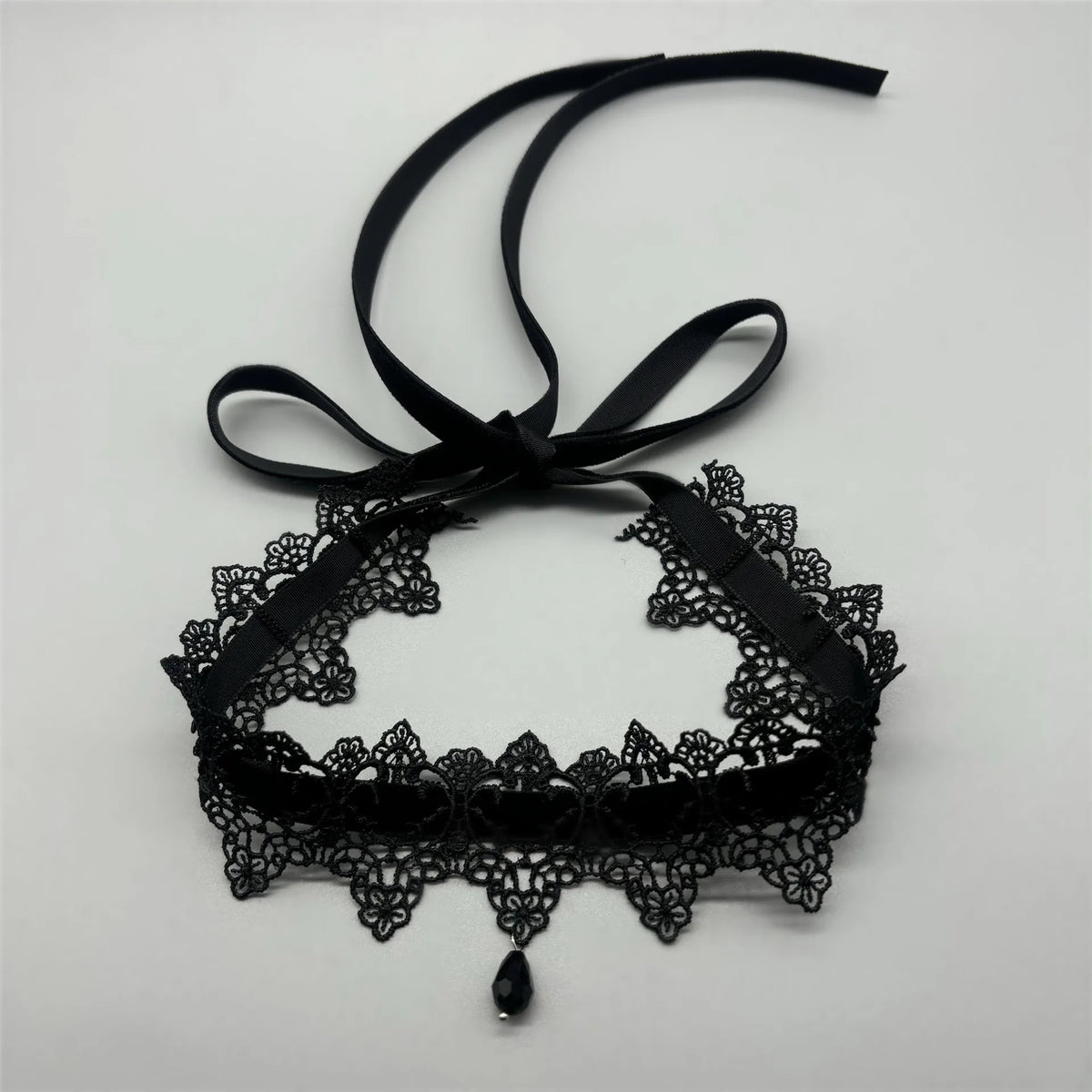 Black sexy lace floral collar for women, stylish jewelry accessory from Corporación Turística, designed for modern fashion.