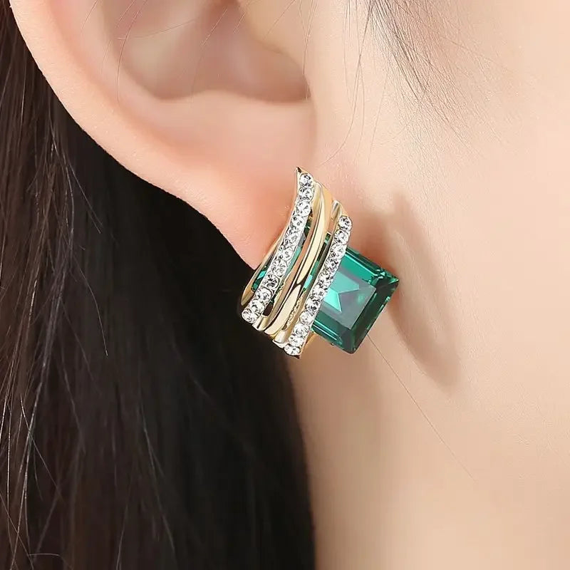 Black crystal zircon diamond-shaped wing earrings for women, elegant jewelry by Corporación Turística