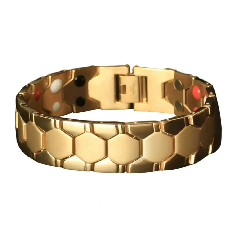 Magnetic therapy bracelet for men with alloy design, black color, from Corporación Turística, shown on a man's wrist.